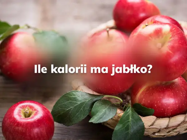 Czerwone jabłka w koszyku, a na nich pytanie: ile kalorii ma jabłko? Zdrowe przekąski.